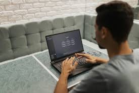 a man using a laptop